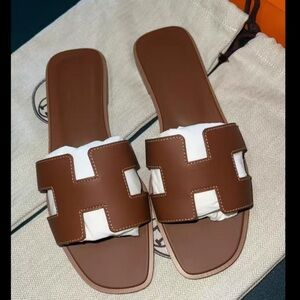 Hermes Brown and White Oran Leather Slide Sandals